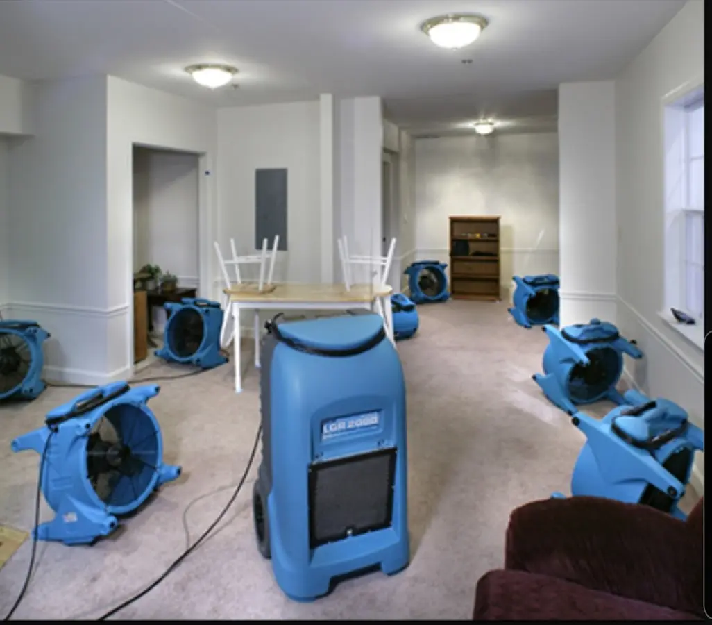Air movers and dehumidifier setup for Water Extraction & Removal in Durham